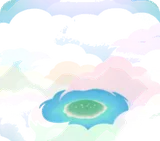 雲間から小島が覗く景色