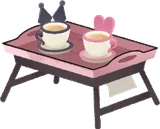 ふたりのマダがのったミニテーブル
