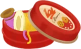 ふたが開いたレトロなクッキー缶