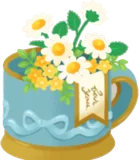 白いお花を生けたカップ