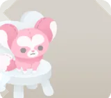 イスに座るラヴォクスのぬいぐるみ