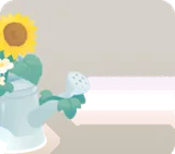 お花を生けたジョウロ