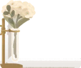 白い小花が挿さった試験管