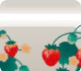 ピンボケした手前の苺