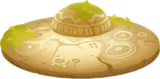 模様が描かれたUFO型の祭壇