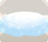 小さな植物の生えた雪の小山