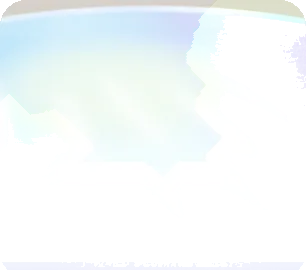 外の光を反射する白い丸テーブルの画像