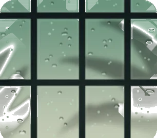 水滴がついた窓・昼の画像
