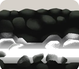 敷き詰められた黒い玉砂利の画像