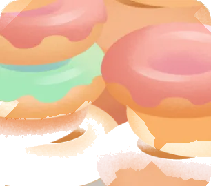 積まれたたくさんのドーナツの画像