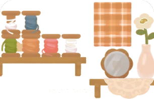 毛糸と雑貨に囲まれた部屋の画像