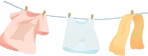 風になびいた洗濯物の画像