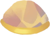 小さな塊の黄金に輝く物質の画像
