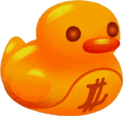金のアヒルのおもちゃの画像