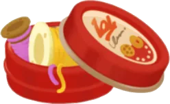 ふたが開いたレトロなクッキー缶の画像