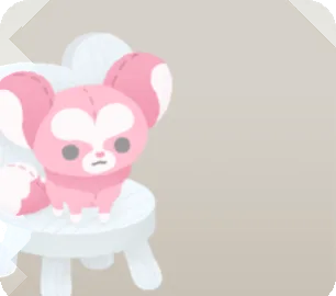 イスに座るラヴォクスのぬいぐるみの画像