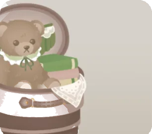 テディベアが入ったトランクの画像