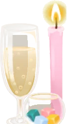コマとキャンドルと祝福のドリンクの画像