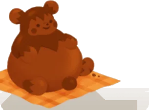 座るプラム・ピーのミルクチョコの画像