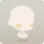 電球の光を受けた頬