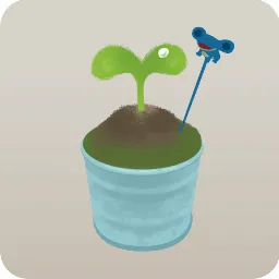 何かの芽が出たブリキ鉢