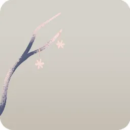 雪の結晶飾りが吊るされた枝・左