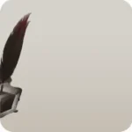 羽根ペンと汚れたインク瓶