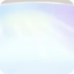 外の光を反射する白い丸テーブル